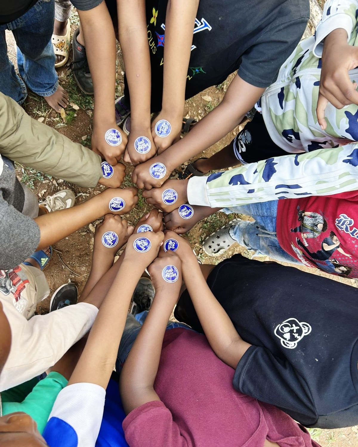 Sancta Maria pupils' fists joined in unity