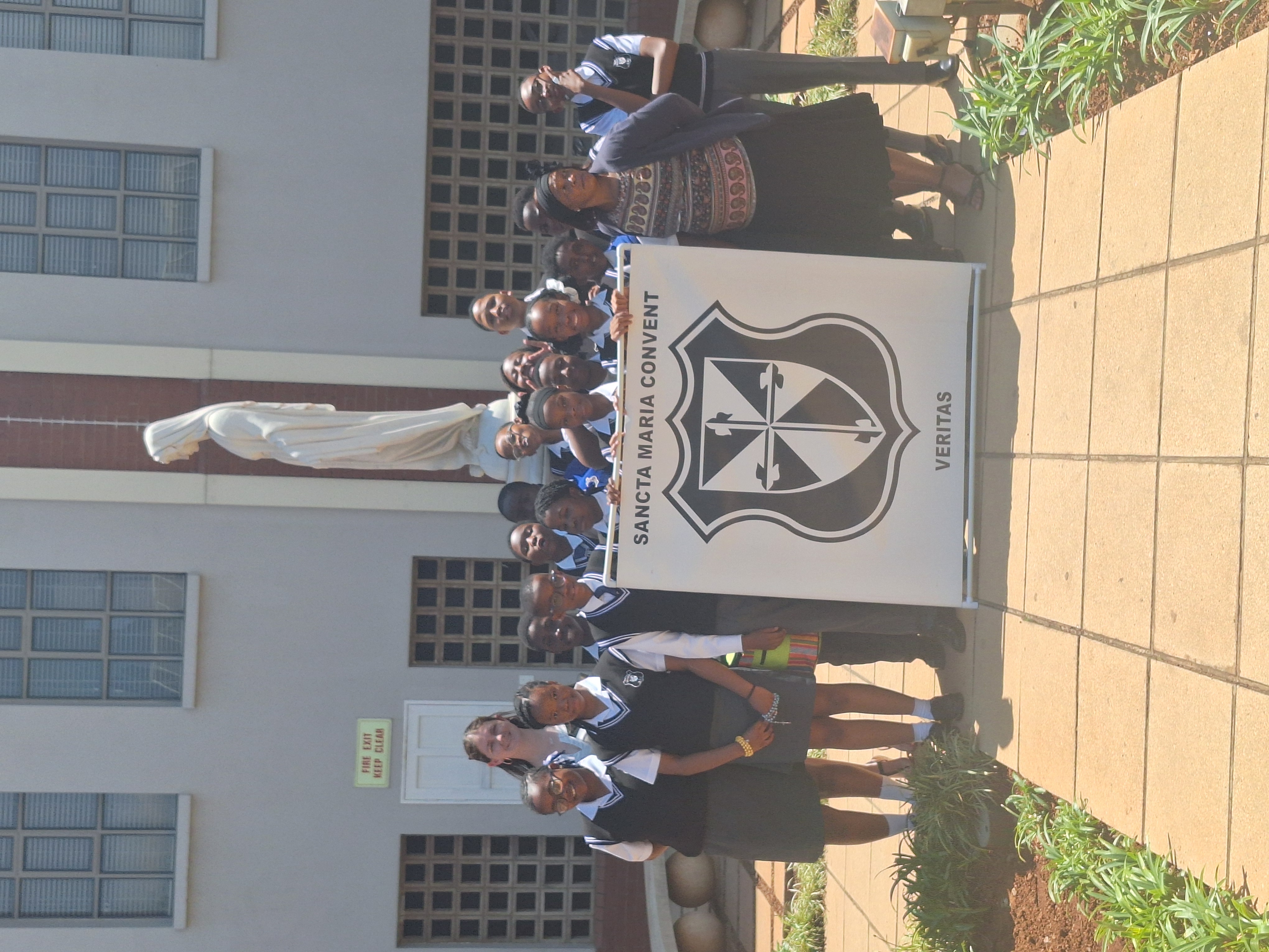 Sancta Maria pupils with the school crest